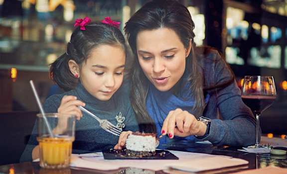 Stock Image of mom and daugher at dinner