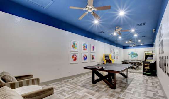 a games room with a ping pong table and a foosball table at The Dresden, Nevada