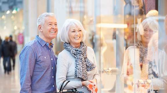 Stock photo of seniors at shopping mall
