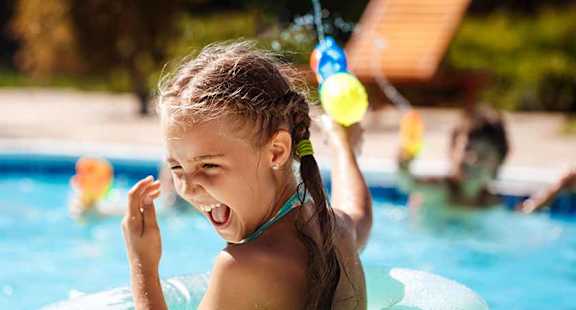 child playing in pool  at SPENCER PLACE, POST FALLS, ID
