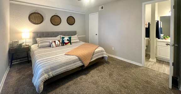 Model bedroom at 2151 Kirkwood, Texas, 77077