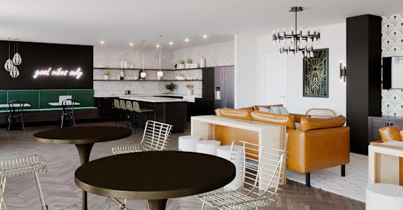 a view of the living room and kitchen from the dining area