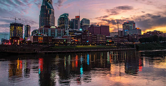 a view of the nashville skyline at sunset