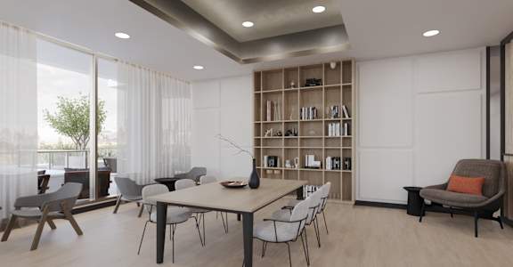 a room with a table and chairs and a bookshelf