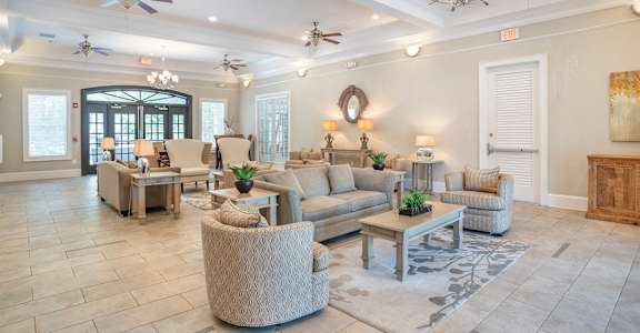 Clubhouse with high ceiling Fan at Broadstreet at EastChase Apartments, Alabama, 36117