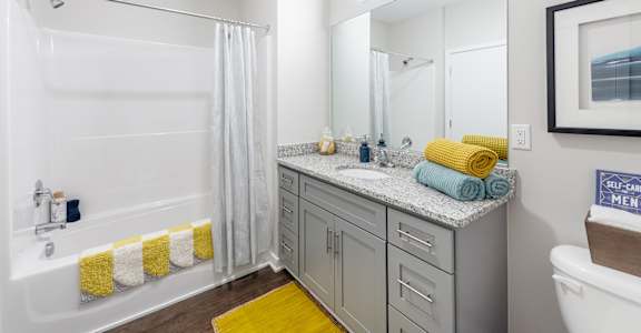Bathroom with vanity at Lumen, Hampton, 23666