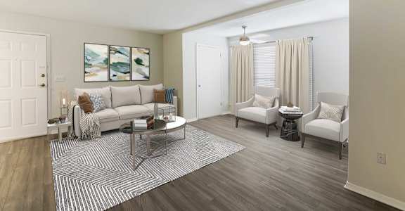 a living room with a couch and two chairs at Southaven Pointe Apartments, Mississippi, 38671