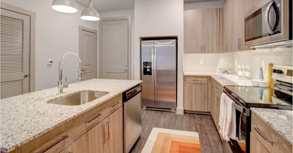 Fully Furnished Kitchen With Stainless Steel Appliances at The Cosmopolitan, Oklahoma