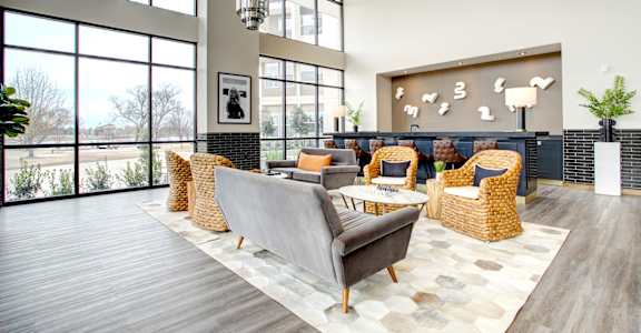 Clubhouse Living Room With Oversized Windows And Doors at The Cosmopolitan, Tulsa, Oklahoma