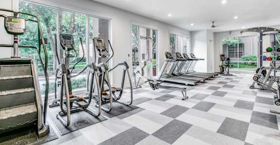 fitness center with cardio equipment
