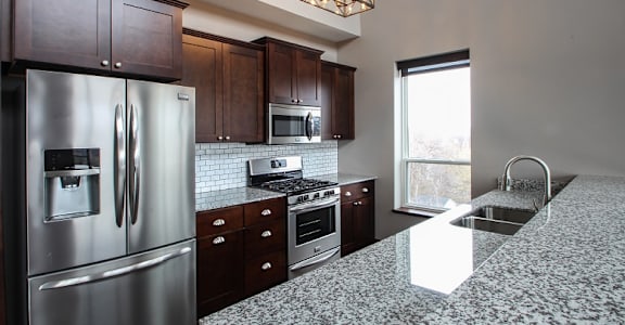 V2 Kitchen with Stainless Steal Appliances and Designer Cabinetry  at Victoria Park and V2 Apartments, Minnesota, 55102