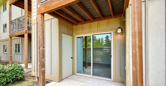 a patio with a sliding glass door
