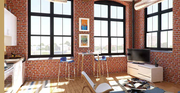 A living room with a brick wall and a television.