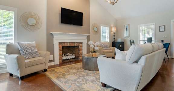 Clubhouse with couch, tv at Crosswinds, Pearl, MS, 39208