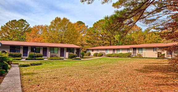 Exterior and walkway at Sea Pines Apartments 2