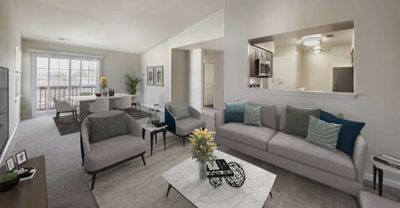 couch, table and tv at The Apartments at Owings Run, Owings Mills, 21117
