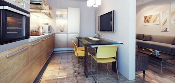 a kitchen and dining room in a small apartment