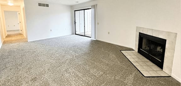 a living room with a fireplace