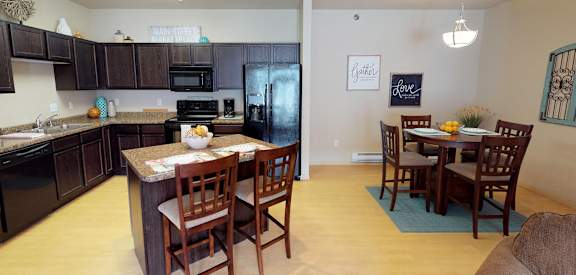 kitchen, dining, island at Stonebridge Villas Apartments, Minot