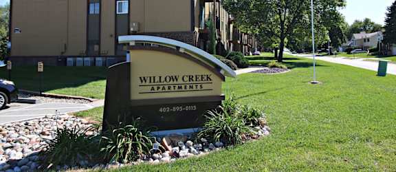 the building where the willow creek apartments are located