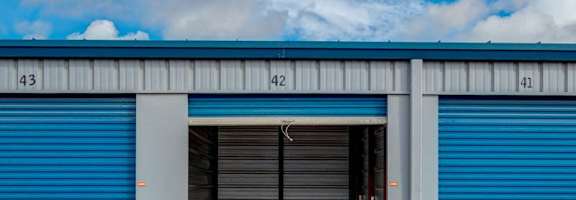 A storage facility with doors numbered 41, 42, and 43.