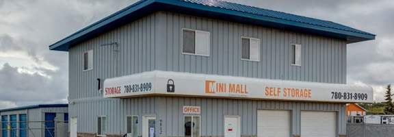 A storage facility with a sign that reads "Inni Mall Self Storage."
