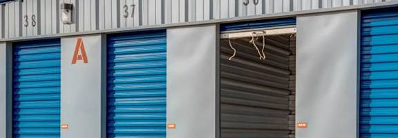A storage facility with doors numbered 36, 37, and 38.