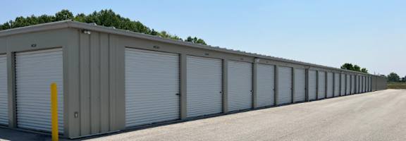 a row of garage doors on the side of a building