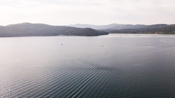 arial view of lake tahoe with mountains in the background