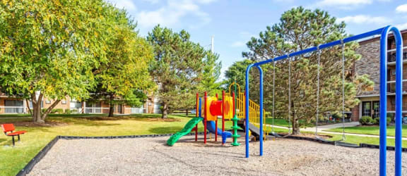 a playground at the residences at omni louisville apartments