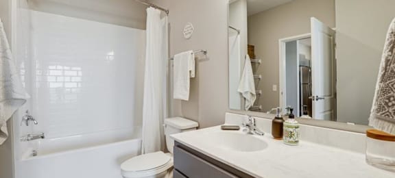 Bathroom With Bathtub at Maven Apartments, Burnsville, MN