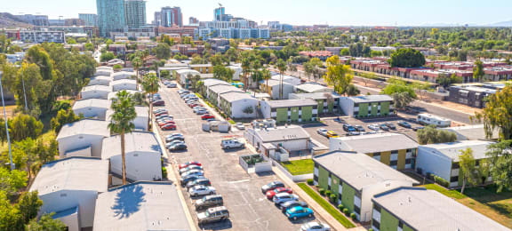 an aerial view of a parking lot in a city with cars parked at Westmount at Downtown Tempe, Tempe, AZ