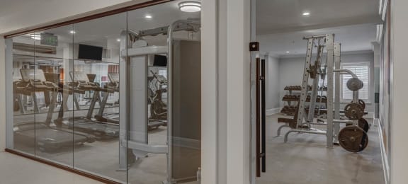 a gym with mirrors and exercise equipment