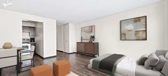 a bedroom with a bed and a living room with a kitchen at Presidential Towers, Illinois, 60661