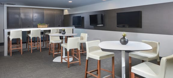 community lounge with tvs | The Montrose Apartments in Chicago, IL