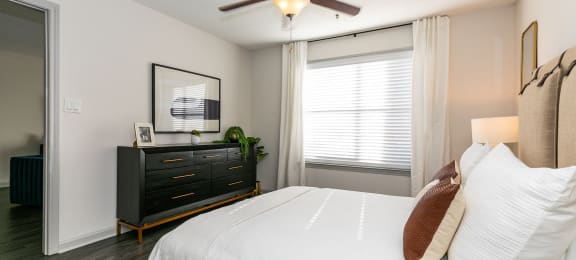 bedroom with large bed and ceiling fan at Briarcliff Apartments, Georgia, 30329