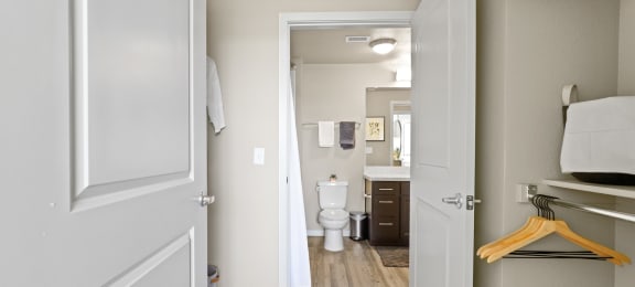 a room with a closet and a toilet and a bathroom at Ridge at Thornton Station Apartments, Thornton, CO 80229