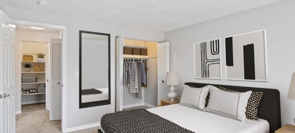 a bedroom with a bed and a closet at Rosemont Square, Randolph, 02368