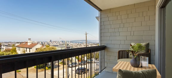 a balcony with a view of the city at Delphine on Diamond, San Francisco, California