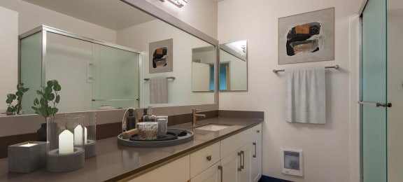 a bathroom with a sink and a mirror at Delphine on Diamond, California