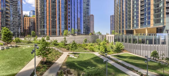 a view of a park with skyscrapers in the background at North Harbor Tower, Chicago