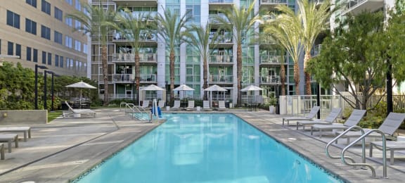 a swimming pool in front of an apartment building  at Vue, California