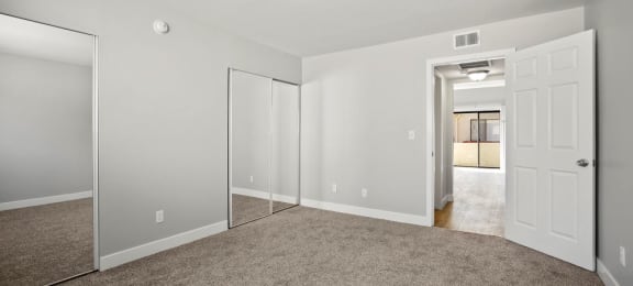 Master Bedroom Sherman Oaks Apartment with Mirrored Closet