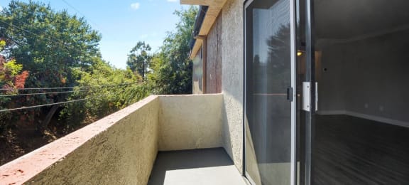 Sherman Oaks, CA Apartments for Rent- Brody Terrace- Sliding Window Door to Patio with Street View