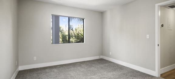One-Bedroom Apartments in Sherman Oaks, CA- Brody Terrace- Wall-to-Wall Carpeting with Spacious Windows and Grey Walls