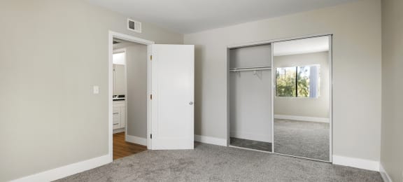 Sherman Oaks Apartments for Rent - Brody Terrace - Bedroom with Plush Carpeting and Mirrored Closet Doors