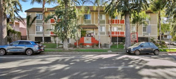 Pet-Friendly Apartments in Sherman Oaks, CA- Brody Terrace- Building Street View with Trees and Sidewalk Access