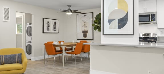Valley Village Apartments - Kling Trio - Living Room With Modern Furniture and Dining Room Table
