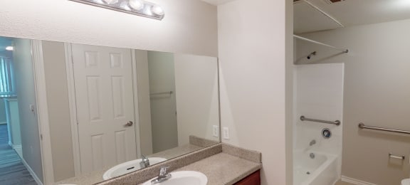 Bathroom with big mirror at The Life at Brighton Estates, Houston