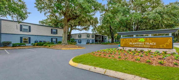 our apartments offer a parking lot in front of the building at Planters Trace, Charleston, SC
